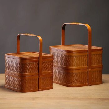 Handcrafted bamboo woven box with lid and handle perfect for traditional food storage tea carrying and portable use